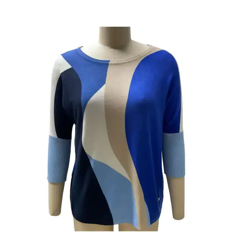 Vibrant abstract print sweater in shades of blue, beige, and black, displayed on a mannequin, perfect for stylish casual wear.