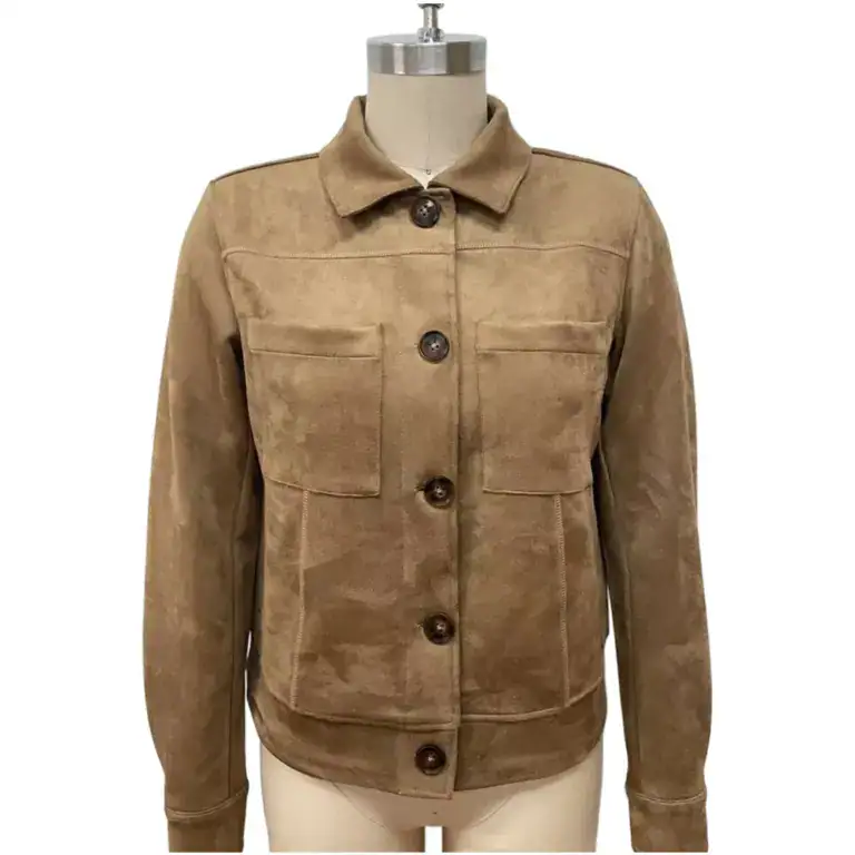 Beige suede jacket with front button closure and chest pockets, perfect for fall and winter fashion.