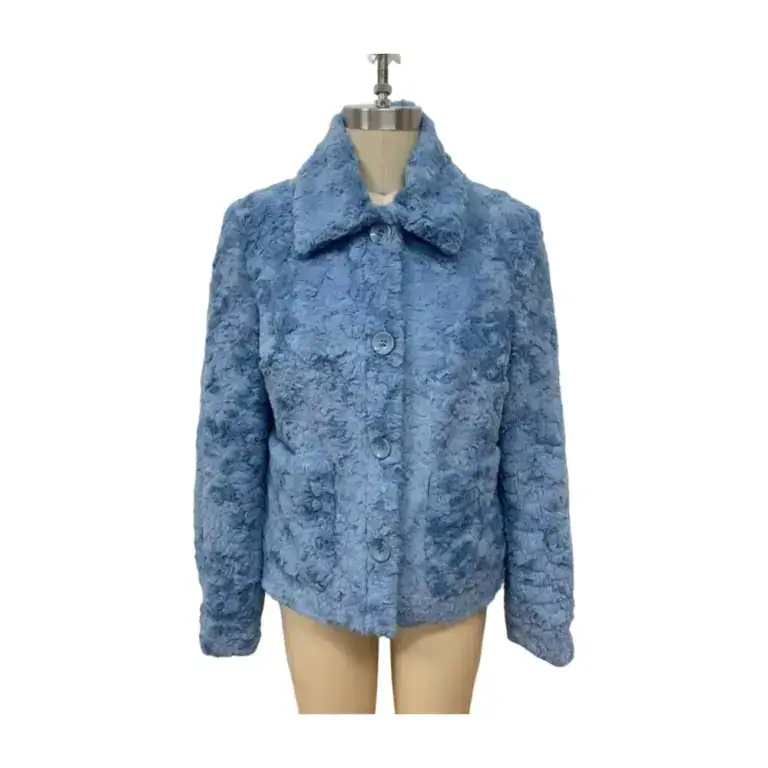 Stylish blue faux fur coat with a classic collar and button closure, perfect for cold weather and fashionable winter outfits.