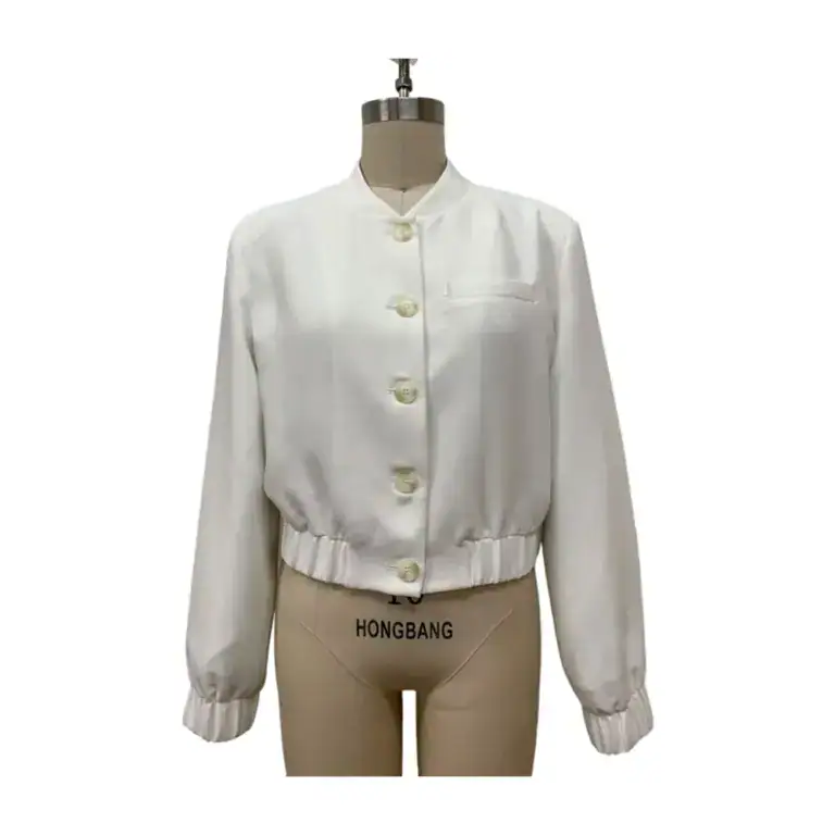 Elegant white casual bomber jacket with elastic cuffs and front button closure, displayed on a mannequin for fashion showcase.