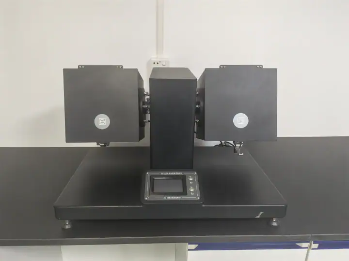 Advanced laboratory balance scale with digital display and dual weighing modules for precise measurements in scientific research.