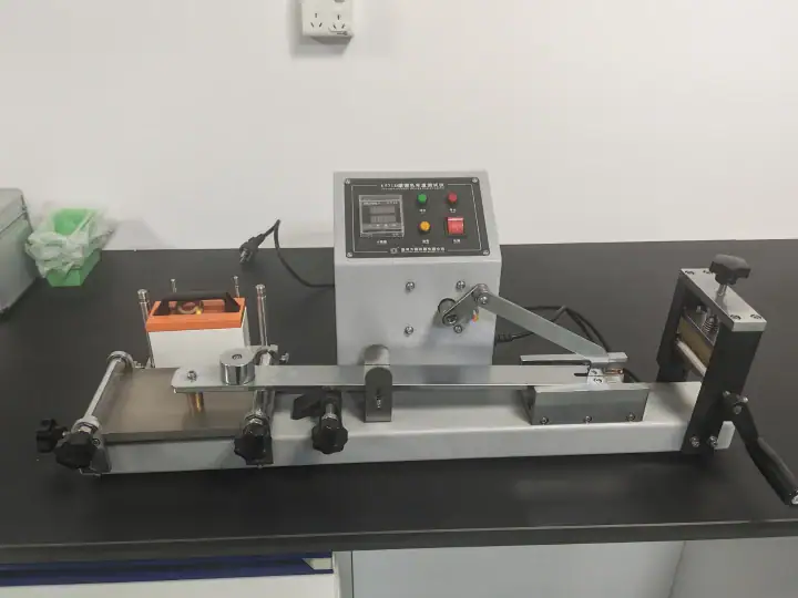 Laboratory testing device used for material analysis and quality control in a scientific laboratory setting.