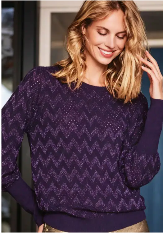 Stylish purple knit sweater with zigzag pattern, perfect for fall and winter fashion, featuring a comfortable fit and trendy design.