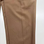 Close-up of stylish brown men's trousers made from high-quality fabric, perfect for formal or business casual wear.