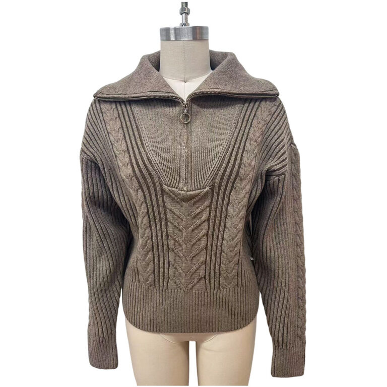 Taupe low gauge knit sweater with a zip-up collar and intricate cable knit pattern, perfect for casual or stylish winter wear.