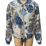 Elegant women's bomber jacket with blue floral embroidery, ribbed collar cuffs, and a front zipper, perfect for stylish casual wear.