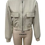 Stylish beige bomber jacket with front zipper and flap pockets, perfect for casual wear and fashion-forward outfits.