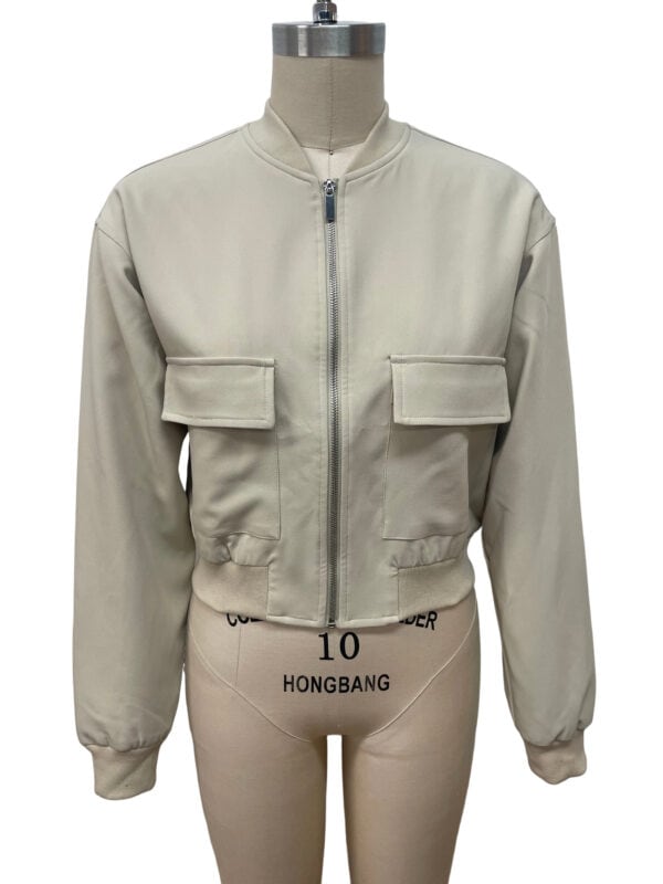 Stylish beige bomber jacket with front zipper and flap pockets, perfect for casual wear and fashion-forward outfits.