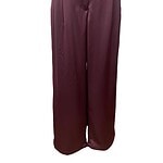 Stylish wide-leg burgundy trousers perfect for office wear or casual outings, made from high-quality fabric with a comfortable fit and modern design.
