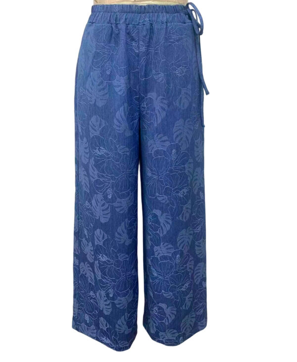 Stylish blue wide-leg pants with floral pattern, perfect for casual or beachwear, featuring an elastic waistband with a drawstring for comfortable fit.