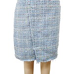 Elegant light blue tweed pencil skirt with multicolored specks, high waist, and gold button detail, perfect for stylish office wear or casual outings.