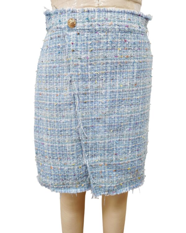 Elegant light blue tweed pencil skirt with multicolored specks, high waist, and gold button detail, perfect for stylish office wear or casual outings.