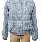 Elegant women's tweed jacket in light blue with multicolored specks, featuring a stand collar and button closure, perfect for stylish casual or formal wear.