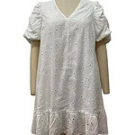 White eyelet dress with puff sleeves and ruffled hem, perfect for summer or casual occasions, featuring floral embroidery and breathable fabric.