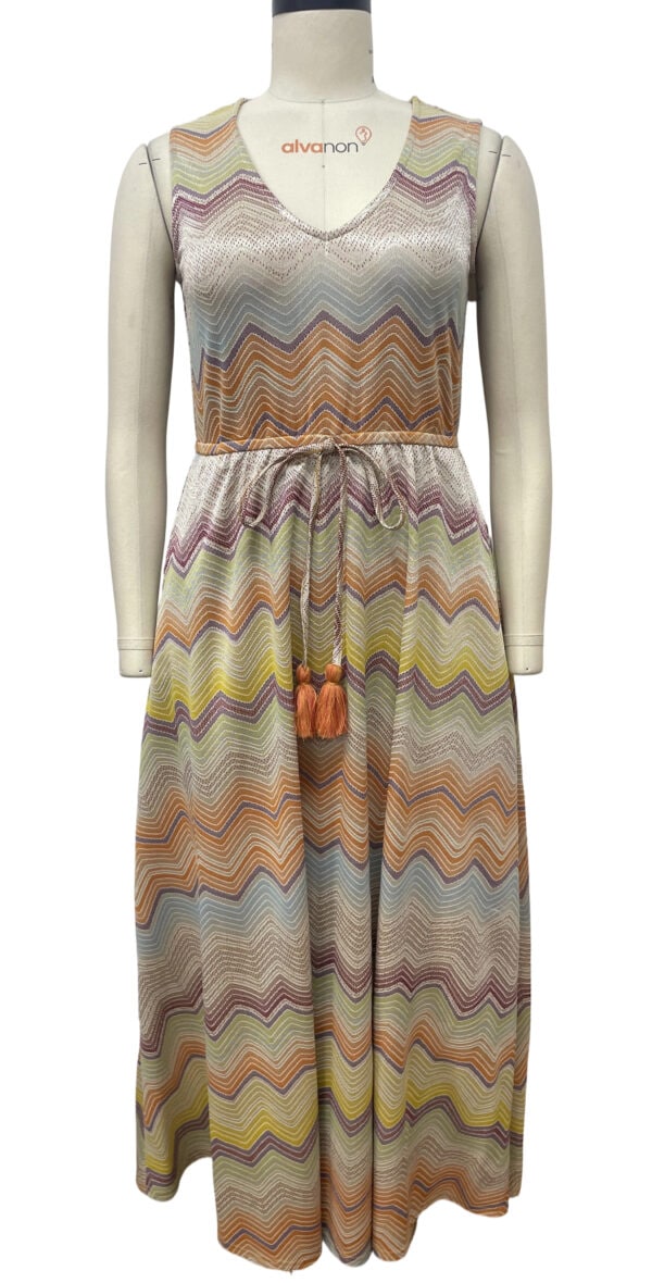 Long maxi dress with multicolored zigzag pattern, sleeveless design, V-neckline, and drawstring waist, perfect for summer or casual wear.
