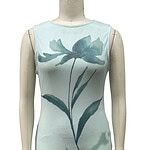Light blue sleeveless dress with a large floral print design, perfect for summer or spring occasions, showcasing stylish and comfortable fashion.