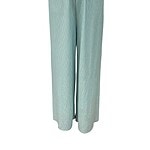 Elegant light blue wide-leg lounge pants with elastic waistband, perfect for comfortable casual wear and relaxation.