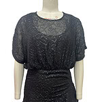 Stylish black sequin dress with short sleeves and ruffled hem, perfect for evening wear or special occasions.
