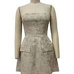 Elegant beige floral dress with long sleeves and a fitted bodice, featuring two front pockets and a subtle floral pattern, perfect for formal occasions.