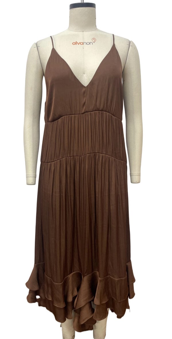 Chic brown spaghetti strap dress with pleated skirt and ruffled hem, perfect for summer or casual outings, available at nbfish-fashion.com.