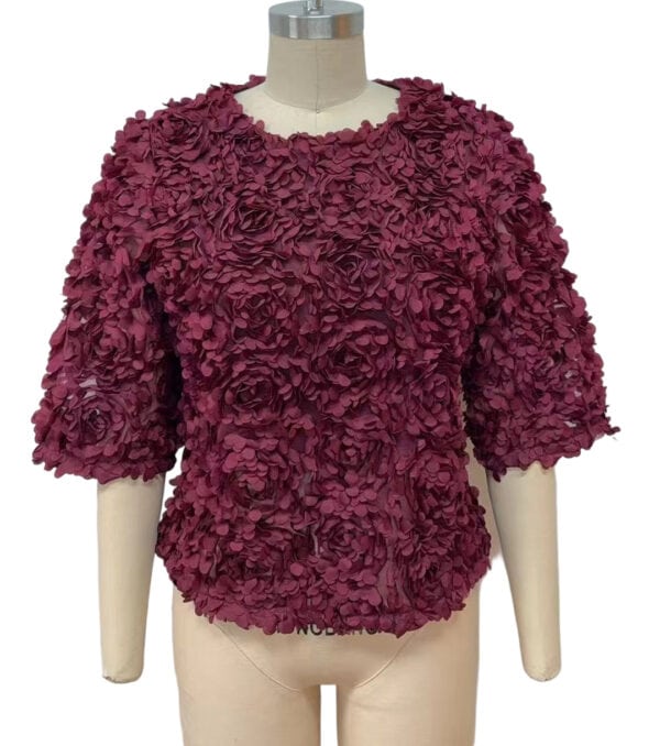 Stylish women's top with 3D floral embellishments in deep burgundy, featuring a round neckline and puffed sleeves, perfect for special occasions.
