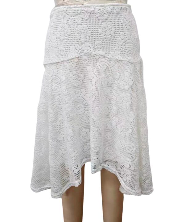 Stylish white crochet skirt with intricate lace patterns, perfect for summer or casual wear, showcasing detailed craftsmanship and lightweight fabric.