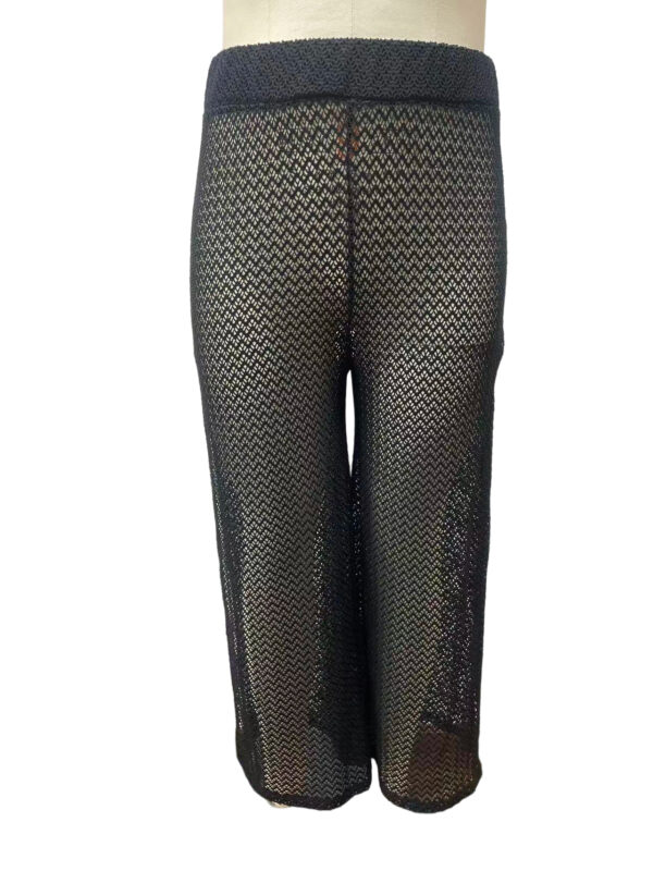 Stylish black sheer cropped pants with zigzag pattern, perfect for fashion-forward outfits and special occasions.