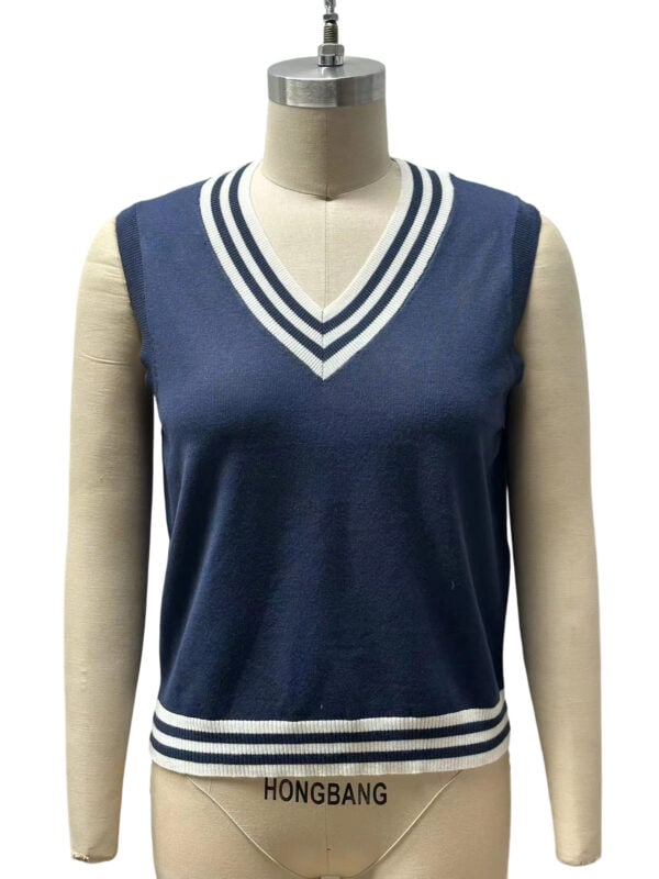 Elegant navy blue sleeveless V-neck sweater vest with white striped accents, perfect for casual or semi-formal wear.