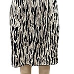 Stylish women's pencil skirt with a bold animal print pattern in black, beige, and gray tones, perfect for fashionable casual or office wear.