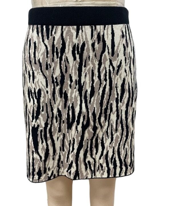 Stylish women's pencil skirt with a bold animal print pattern in black, beige, and gray tones, perfect for fashionable casual or office wear.