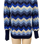 Stylish women's sweater with a blue chevron pattern, long sleeves, and ribbed cuffs and hem, perfect for casual or office wear.