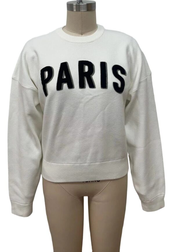 White sweatshirt with bold black 'PARIS' lettering, perfect for casual wear and street style fashion.