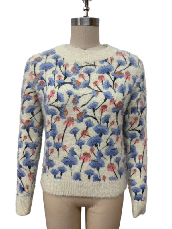Cream-colored women's sweater with a vibrant floral pattern in blue, pink, and black, featuring long sleeves and a round neckline, perfect for casual wear.