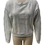 Stylish silver knit sweater with intricate patterns, perfect for casual or formal wear, displayed on a mannequin for fashion showcase.