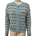 Light blue women's cardigan with yellow and green floral pattern, button-up front, and ribbed cuffs and collar, perfect for casual or office wear.