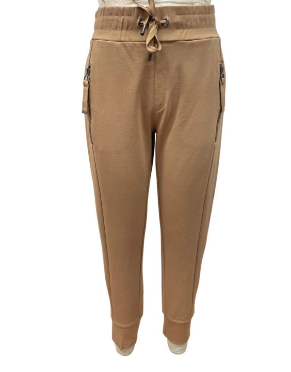 Stylish tan jogger pants with drawstring waist and zippered pockets, perfect for casual wear and active lifestyles.