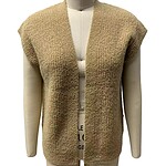Stylish beige knitted vest displayed on a mannequin, perfect for layering in fall and winter fashion.