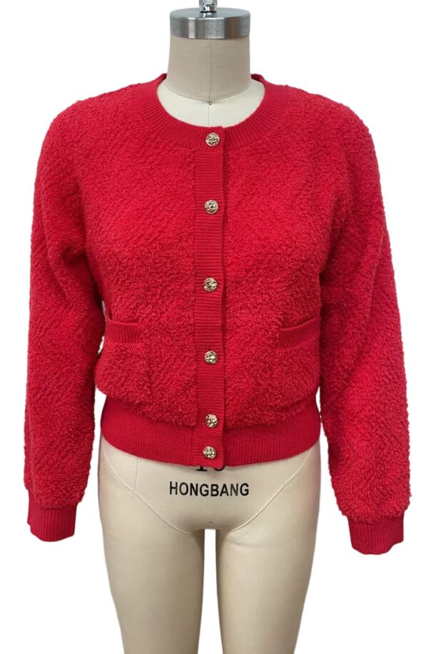 Elegant red knit cardigan with gold buttons, perfect for stylish winter or fall outfits, featuring a cozy and fashionable design.