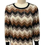 Women's sweater with a zigzag pattern in shades of brown, beige, black, and cream, featuring a round neckline and long sleeves, perfect for fall and winter fashion.