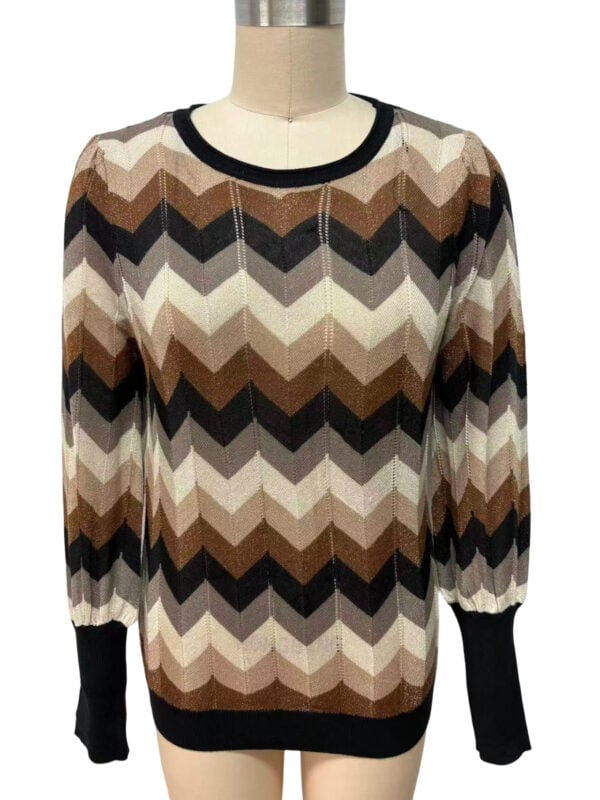 Women's sweater with a zigzag pattern in shades of brown, beige, black, and cream, featuring a round neckline and long sleeves, perfect for fall and winter fashion.