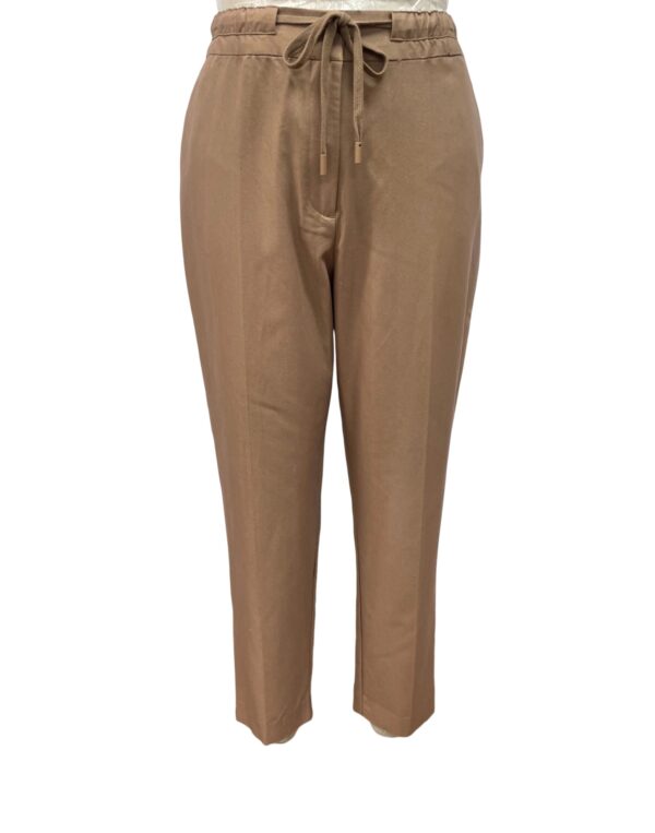 Comfortable beige women's pants with drawstring waist, suitable for casual wear and everyday comfort.