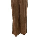 Stylish brown corduroy wide-leg pants for women, featuring a high waist, front button closure, and relaxed fit, perfect for casual or office wear.