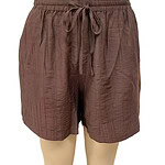 Comfortable brown linen shorts with an elastic waistband and drawstring, perfect for casual summer wear and outdoor activities.