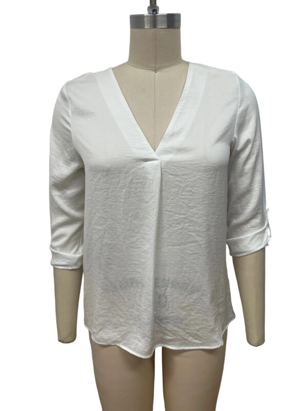 White women's blouse with V-neck and three-quarter sleeves, perfect for casual or office wear, made from lightweight fabric.