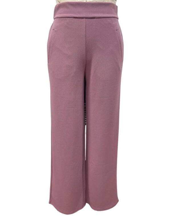 Stylish pink wide-leg trousers for women, perfect for casual and formal wear, made from comfortable fabric with a high waist design.