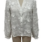 White women's blouse with floral embroidery, long sleeves, and button-up front, perfect for stylish casual or formal wear.