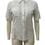 White eyelet blouse with intricate cut-out patterns, short sleeves, and a classic collar, perfect for casual or semi-formal occasions.