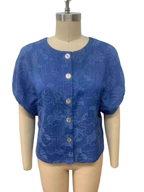 Stylish blue floral blouse with button closure and puff sleeves, perfect for casual or semi-formal occasions.