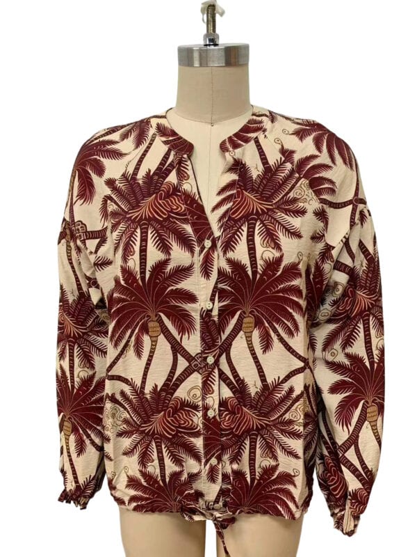 Women's tropical palm tree print jacket in beige and maroon, featuring a relaxed fit and front zipper, perfect for casual summer wear.