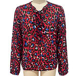 Colorful animal print blouse with a bow tie at the neckline, long sleeves, and a relaxed fit, perfect for casual or office wear.